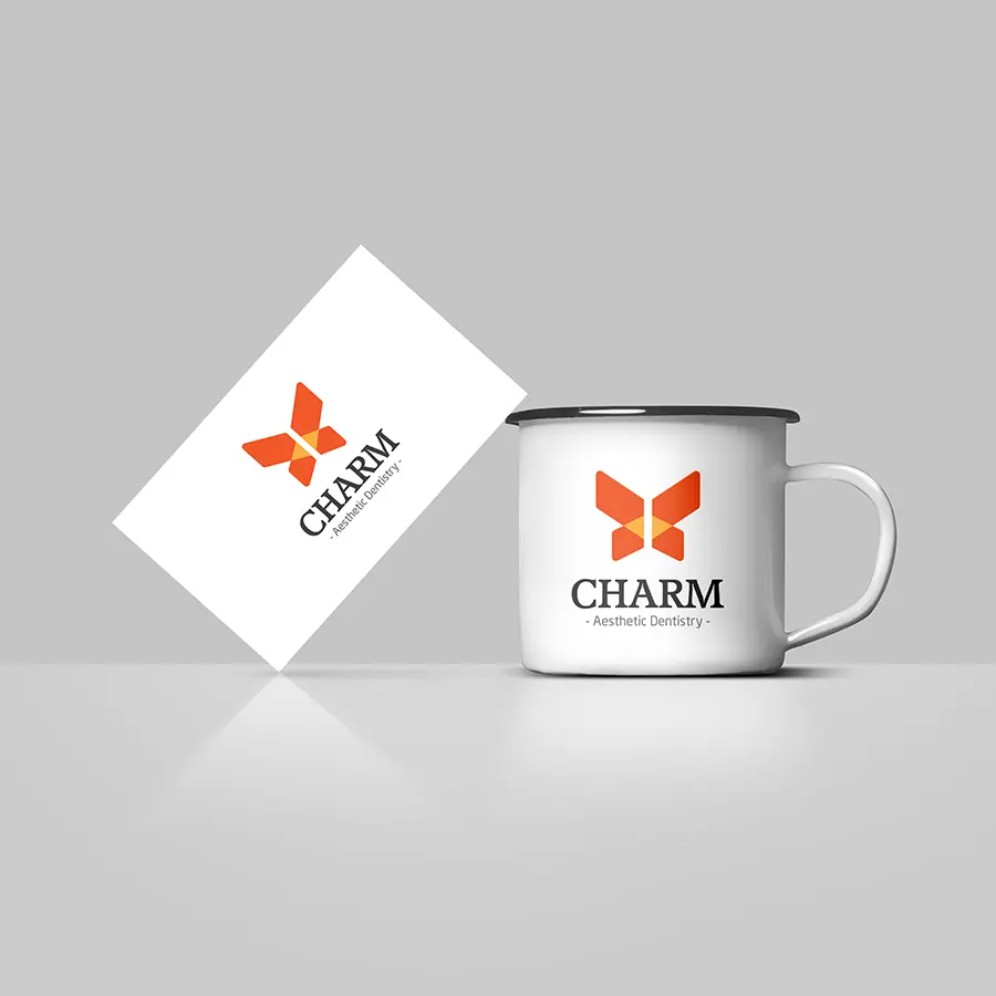 Charm aesthetic dentistry logo branding mockup shown across simple brand items with consistent color tone and clear symbol placement