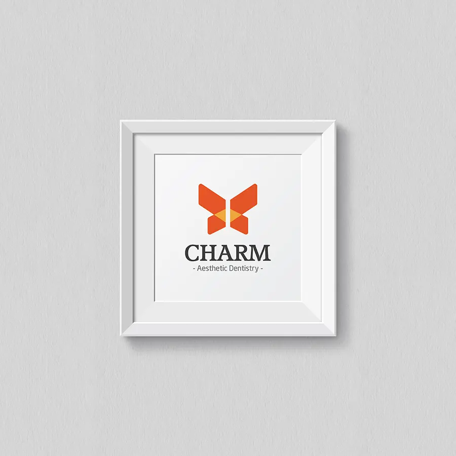 Charm aesthetic dentistry logo image displayed as a standalone mark with a butterfly symbol balanced proportions and neutral background