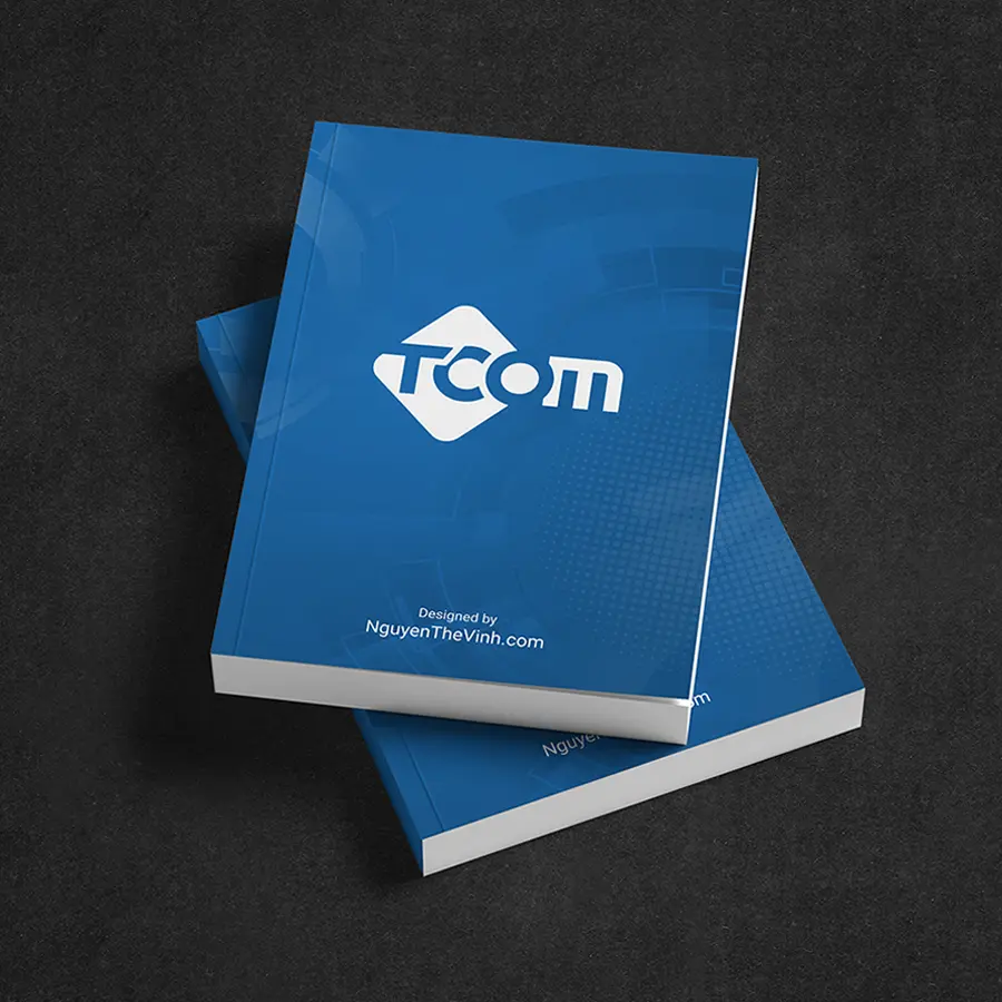 Technology logo design Tcom shown on branding mockup with blue cover design reflecting a structured and professional brand identity