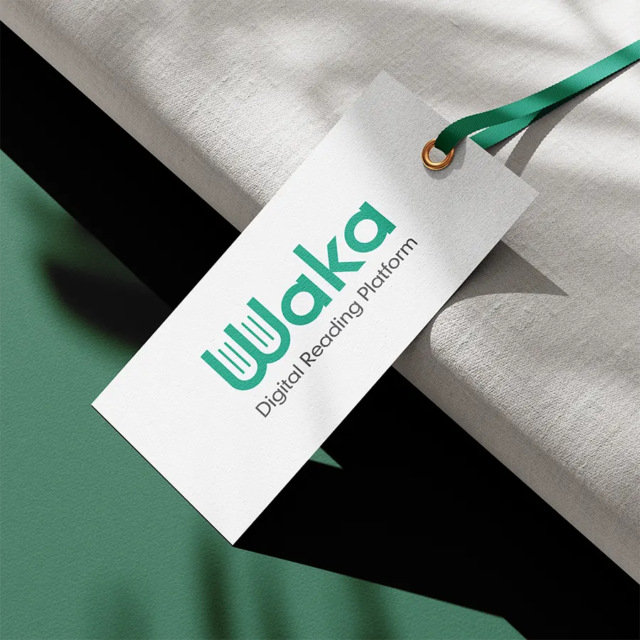 Waka logo printed on a paper tag with clean layout and balanced spacing